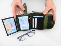 Bild in Galerie Ansicht laden, Damenbörse mit pflanzlich gegerbtem Leder und floraler Ornamentik als Relief.  
